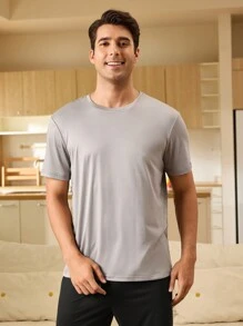 Conjunto de ropa de hogar para hombres con top de cuello redondo y pantalones de unicolor, simple y cómodo