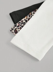 SHEIN Compra 1 Obtén 3 Camiseta versátil de manga larga con cuello alto estilo leopardo en negro y blanco para adolescentes