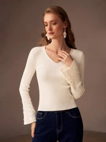 MOTF PREMIUM Jersey de punto estriado de ajuste ceñido con cuello en V, mangas de campana y detalles de perlas falsas