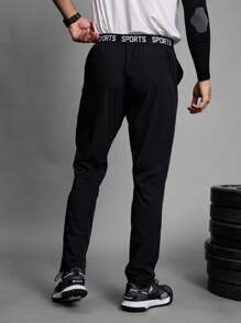 Manfinity Sport Corelite Pantaloni sport casual pentru bărbați, stil iubit, cu imprimeu de scrisoare, cu talie elastică, stil iubit - Negru - Vizualizare 8