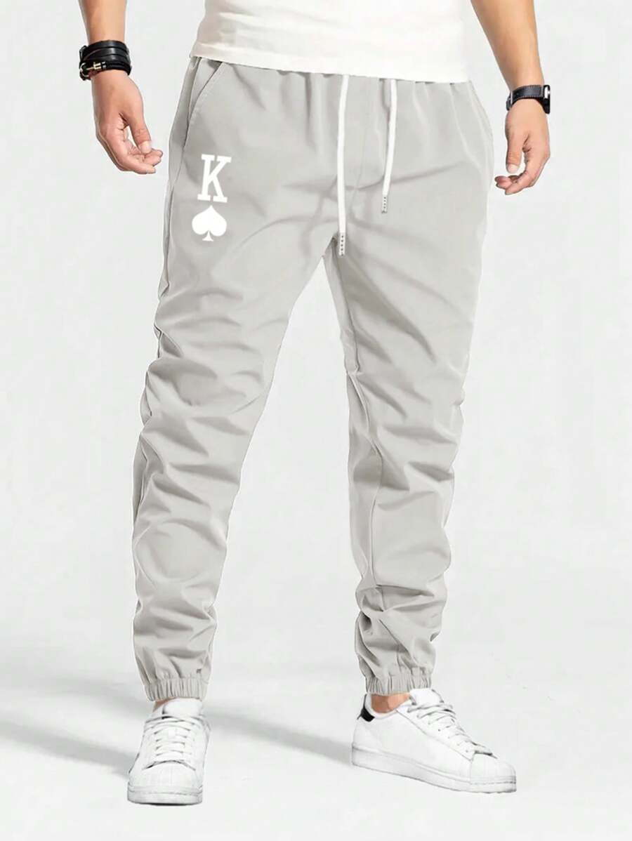 Manfinity Homme Pantalones casuales para hombre con estampado de póker, cintura con cordón y puños - Gris Claro - Ver 1