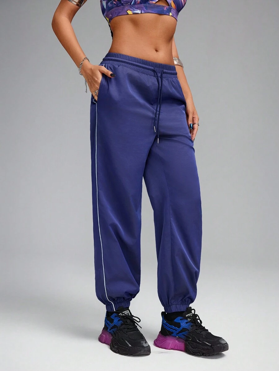 Innovista Pantalones largos para mujer de deporte con zona luminosa y cintura ajustable, para senderismo, campamento al aire libre, uso diario informal y casual, otoño, con dobladillo ajustable y ajustable con cordón, leggings acampanados, marca FP Movement y WAG, apta para aerobics en casa - Azul - Ver 1