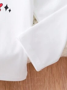 SHEIN Camiseta informal de manga larga y cuello redondo con estampado de Papá Noel de dibujos animados para niñas, otoño