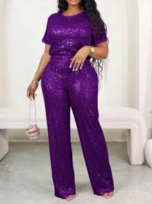 夏季女士派对套装，纯色圆领短袖上衣和裤子，带口袋的华丽时尚亮片裤子。女士夏装，商务休闲女士