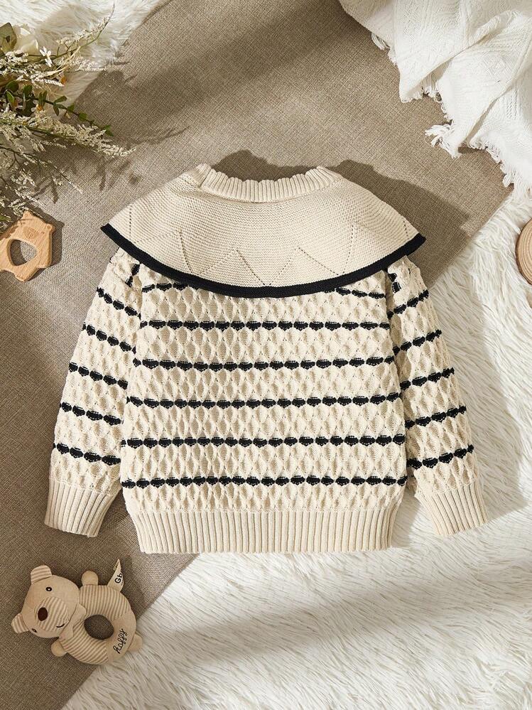 SHEIN Vintaside Kids 少女套头衫，秋冬时尚新品。奶油色、杏色和黑色条纹针织面料，柔软甜美。宽领口设计展现活泼气息，充满感觉。袖口精致华丽。适合秋冬穿着。面料质感强，柔软亲肤，轻盈舒适，温暖舒适，给小女孩带来更多舒适感。适合各种场合，展现好学女孩的优质风范，适合居家休闲、校园聚会、节日和派对。 - 米色 - 查看 2