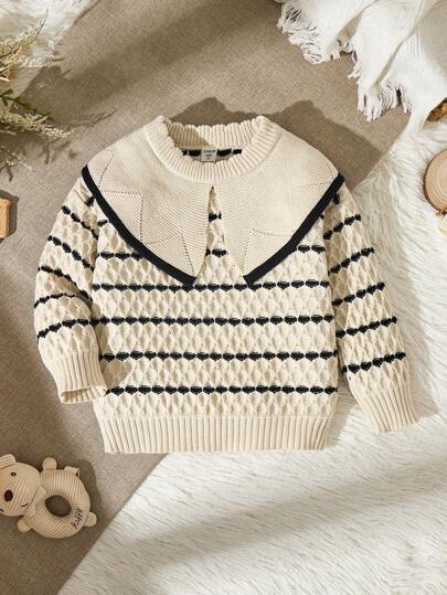 SHEIN Vintaside Kids 少女套头衫，秋冬时尚新品。奶油色、杏色和黑色条纹针织面料，柔软甜美。宽领口设计展现活泼气息，充满感觉。袖口精致华丽。适合秋冬穿着。面料质感强，柔软亲肤，轻盈舒适，温暖舒适，给小女孩带来更多舒适感。适合各种场合，展现好学女孩的优质风范，适合居家休闲、校园聚会、节日和派对。