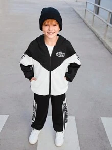 SHEIN Bộ đồ thể thao dệt kim đơn sắc, thoải mái, thường ngày dành cho bé trai tuổi teen, thích hợp cho chạy bộ, đạp xe. - Đen và trắng - Xem 5