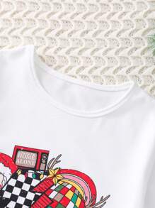 SHEIN Camiseta informal de manga larga y cuello redondo con estampado de Papá Noel de dibujos animados para niñas, otoño