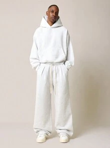 SUMWON Conjunto de 2 piezas de sudadera con capucha esencial corta y pantalones de chándal acampanados plisados