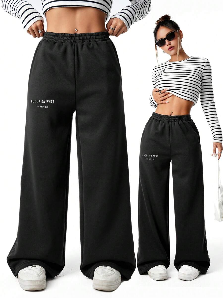 SHEIN Sparklyn Pantalón de chándal informal para adolescentes con estampado de letra y floral - Negro - Ver 1