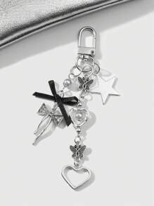 ROMWE Kawaii 1 件 Y2K 极简主义百搭极具吸引力的银色空心蝴蝶心形星形黑色丝带水钻蝴蝶 CCB 珠钥匙扣、包包饰物、耳机配件 - 适合女性、日常佩戴、礼物 - 銀色 - 查看 8