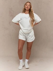 MISSGUIDED Conjunto de dos piezas con camiseta oversize y pantalones cortos con aplicaciones de rhinestones "WIFEY"