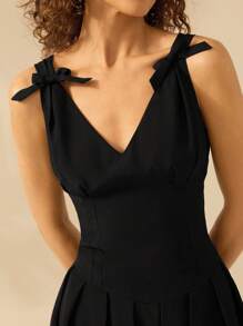 CAJUNI 女士 V 领无袖装饰蝴蝶结黑色短裙，假日休闲沙滩夏装 - 黑色 - 查看 7