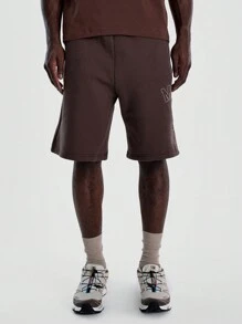 Musero Pantalones cortos tipo jogger de corte holgado con estampado gráfico para hombre