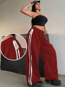Flirla Pantalones con dobladillo para mujer de talla grande, con bordado en la costura lateral, cintura elástica con cordón ajustable y tobillos