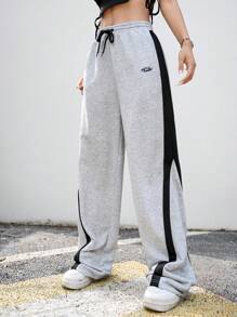 Manfinity Unisex Pantalones de chándal rectos y con cordón a media cintura de punto en patchwork, unisex