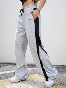 Manfinity Unisex Pantalones de chándal rectos y con cordón a media cintura de punto en patchwork, unisex