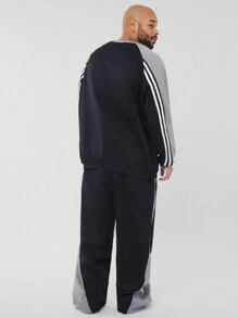 Manfinity NXTstreet Conjunto de sudadera holgada con gráfico de letras y pantalón de punto para hombres de talla grande
