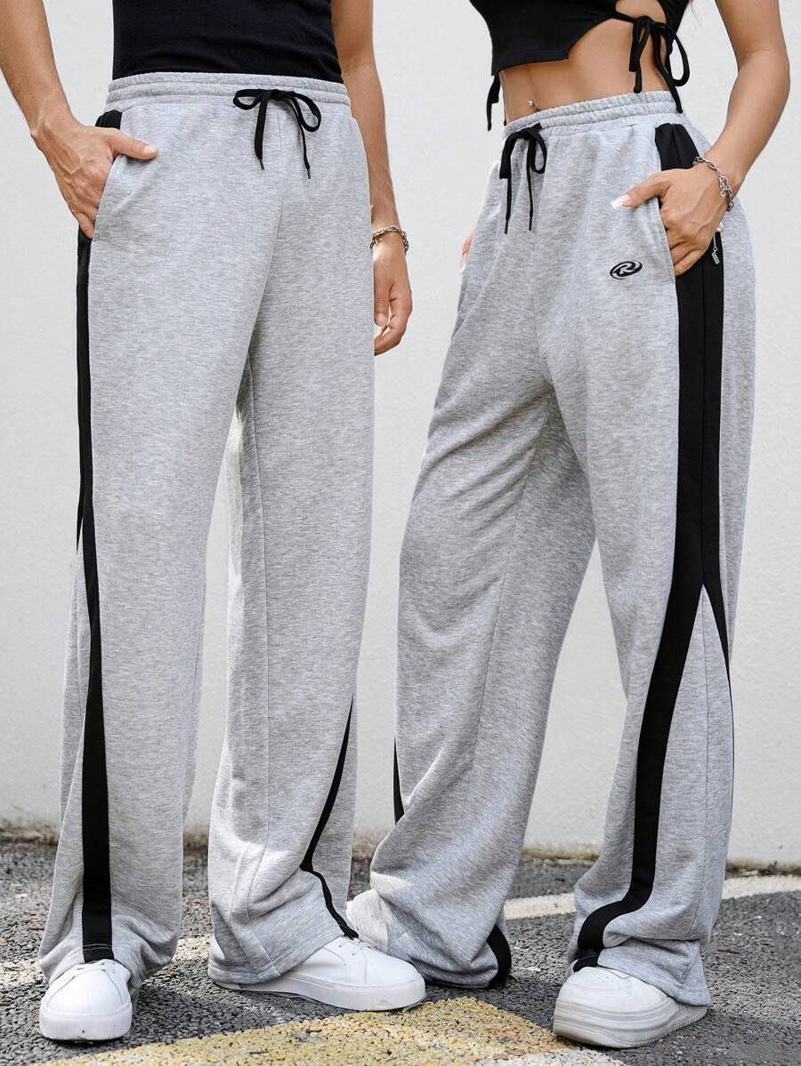 Manfinity Unisex Pantalones de chándal rectos y con cordón a media cintura de punto en patchwork, unisex