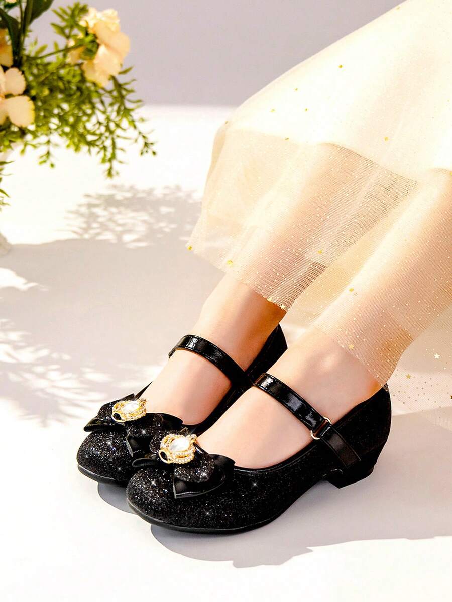 Váy dự tiệc thu/đông kết hợp với nơ đen lấp lánh trang trí giày cao gót cho trẻ em - màu đen - Xem 1