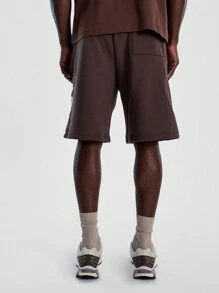 Musero Pantalones cortos tipo jogger de corte holgado con estampado gráfico para hombre