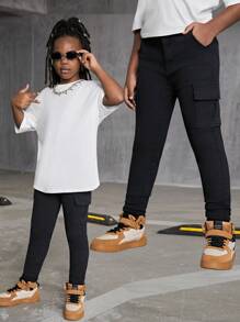 SHEIN Jeans de mezclilla con bolsillos con botones para niño preadolescente, uso versátil y casual para primavera y otoño