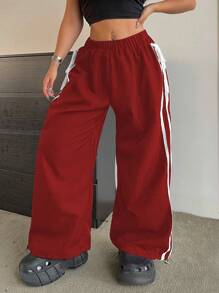 Flirla Pantalones con dobladillo para mujer de talla grande, con bordado en la costura lateral, cintura elástica con cordón ajustable y tobillos