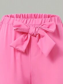 Conjunto de blusa e calças largas com decote assimétrico estiloso para meninas 2024