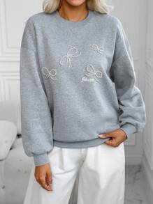 SHEIN LUNE New Autumn Fashion Casual Pearl Bow Round Neck Long Sleeve Print Women Sweatshirt Pullover Fall Outfit