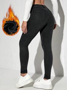 SHEIN Essnce Pantalones vaqueros casuales ceñidos con forro térmico y bolsillos, versátil y grueso, para mujer
