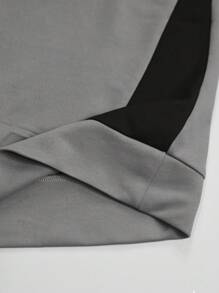 Manfinity LEGND Conjunto casual de sudadera y pantalón de chándal con cuello redondo y manga raglán con estampado de letras para hombres talla grande, otoño