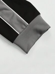Manfinity LEGND Conjunto casual de sudadera y pantalón de chándal con cuello redondo y manga raglán con estampado de letras para hombres talla grande, otoño