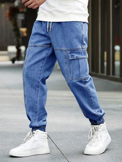 Manfinity Homme 宽松抽绳纯色男式慢跑工装牛仔裤，侧面有翻盖口袋