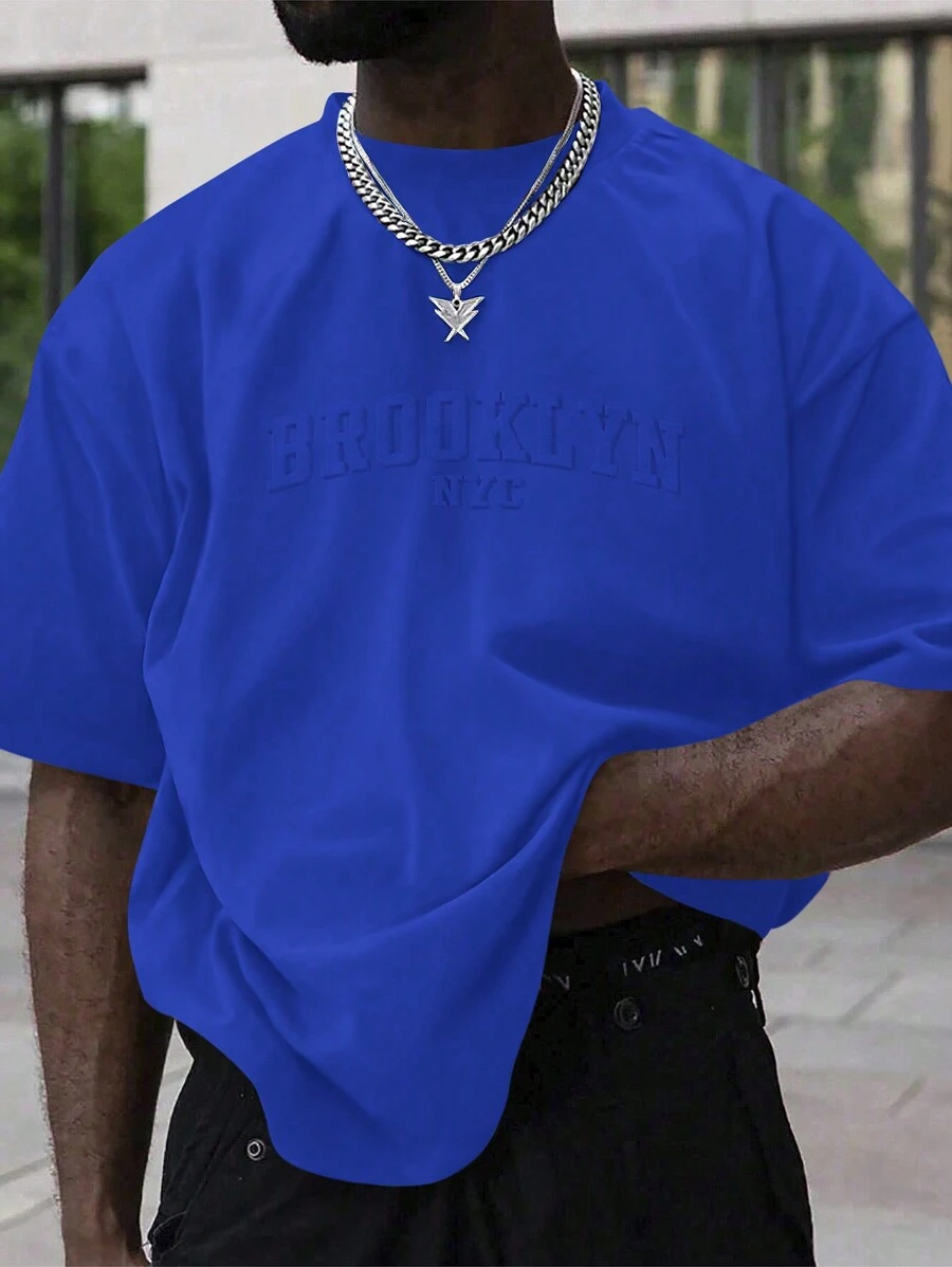 Manfinity Roughcore Camiseta de manga corta suelta de unicolor con diseño en relieve de letra, estilo casual de calle para hombre, para el verano - azul real - Ver 1
