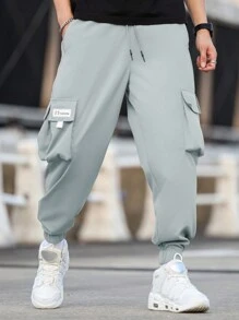 Manfinity Homme Men Plus Size Loose Fit Letter Patched Detail Flap Pocket Drawstring Waist Cargo Pants