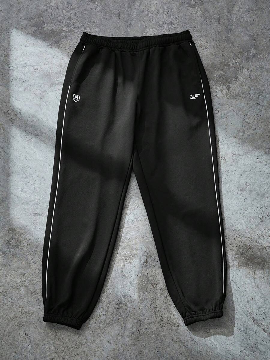 Manfinity Sport Corelite Quần Jogger Thể Thao Sọc Hai Bên Lưng Thun Co Giãn Phong Cách Bạn Trai Cho Nam Mùa Thu - màu đen - Xem 1