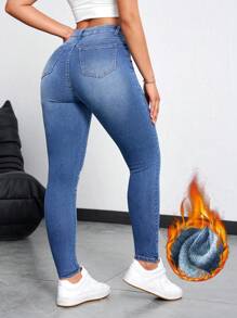 SHEIN Essnce Pantalones vaqueros delgados casuales de mujer con forro térmico y bolsillos, denim grueso y calentito