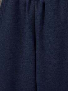 SHEIN Set de 2 piezas para niños preadolescentes que incluye sudadera con capucha 2 en 1 + pantalones de unicolor