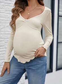SHEIN Camiseta de manga larga casual de cuello en V liso para maternidad, otoño