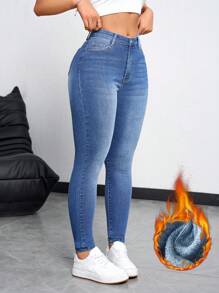 SHEIN Essnce Pantalones vaqueros delgados casuales de mujer con forro térmico y bolsillos, denim grueso y calentito