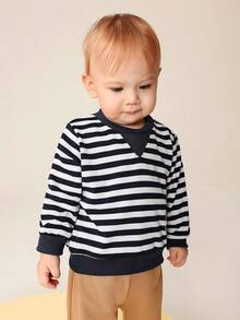 SHEIN 2 Stücke Set aus langärmligem, gestreiftem Rundhalsshirt und bundfreien, einfarbigen langen Hosen für Babys, warm und bequem für Babys im Herbst und Frühling. Dieses Set eignet sich sowohl für den Alltag als auch für zu Hause. Dieses vielseitige Set eignet sich für den Alltag von Babys zu verschiedenen Anlässen und sorgt dafür, dass sie sich in den Übergangsjahreszeiten wohlfühlen.