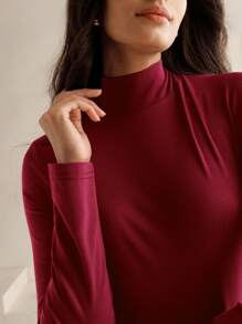 Anewsta 都市高端针织与编织混合长袖立领高低下摆中长连衣裙