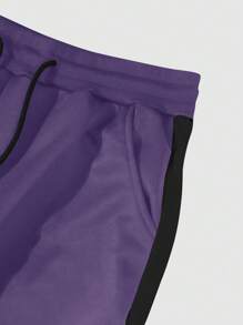Manfinity EMRG Pantalón de chándal informal para hombres con bloqueo de color e impresión de letras con cordón