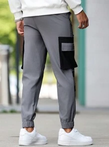 Manfinity Homme Men's Contrast Color Casual Sports Pants, Slim Tapered, Elasticated Cuffs, Zipper, Large Contrast Pockets, Mature Casual Trousers