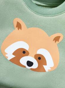 SHEIN Playful Pals This Newborn Baby Boy Outfit Includes 1 Top And 1 Pants, Designed With Adorable Cartoon Raccoon Pattern. The High-Quality Fabric And Thoughtful Design Provide Comfort And Fashion, Suitable For Both Daily Wear And Special Occasions. This Set Is An Ideal Choice For Your Baby.