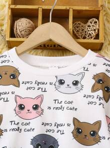 SHEIN Áo nỉ chui đầu thoải mái, rộng rãi, cổ tròn, tay dài in hình mèo hoạt hình dễ thương cho bé gái, ấm áp và thoải mái, phải có, đa năng, mùa thu và mùa đông, phải có, tuyệt vời để mặc thường ngày và đi học hàng ngày. Đa năng. - trắng - Xem 4