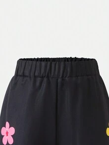 SHEIN Girls' Black Pants With Colorful Floral Pattern, Casual & Fashionable Design, Suitable For Spring And Autumn