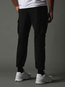 SUMWON 运动服舒适优质货运慢跑裤，带反光印花、隐藏拉链口袋和带橡胶头的编织拉绳 - 黑色 - 查看 4