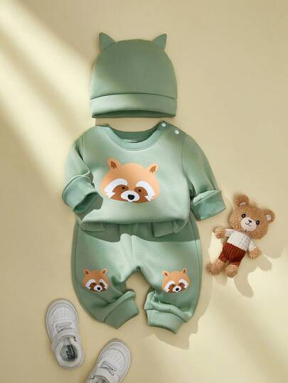 SHEIN Persoplay Kids This Newborn Baby Boy Outfit Includes 1 Top And 1 Pants, Designed With Adorable Cartoon Raccoon Pattern. The High-Quality Fabric And Thoughtful Design Provide Comfort And Fashion, Suitable For Both Daily Wear And Special Occasions. This Set Is An Ideal Choice For Your Baby.