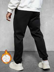 Manfinity Homme Quần dài chạy bộ giữ nhiệt màu trơn rộng rãi có dây rút eo ấm áp cho nam, quần nỉ lót nhiệt màu đen, quần nỉ dài trơn, dành tặng chồng, quà tặng bạn trai - màu đen - Xem 2